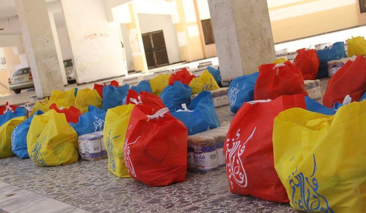 بلدي سرت يوزع السلة الرمضانية بالتعاون مع الكشافة