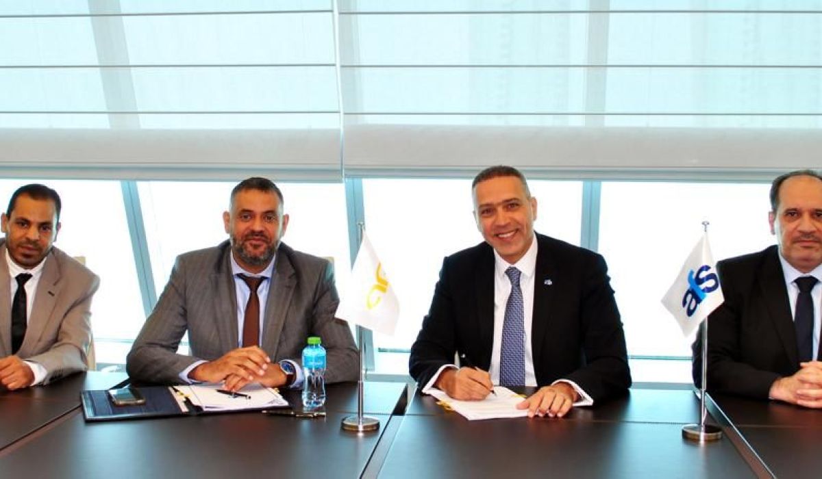 توقيع إتفاقية بين مصرف الوفاء وشركة الخدمات المالية العربية (AFS) لمعالجة المدفوعات الرقمية